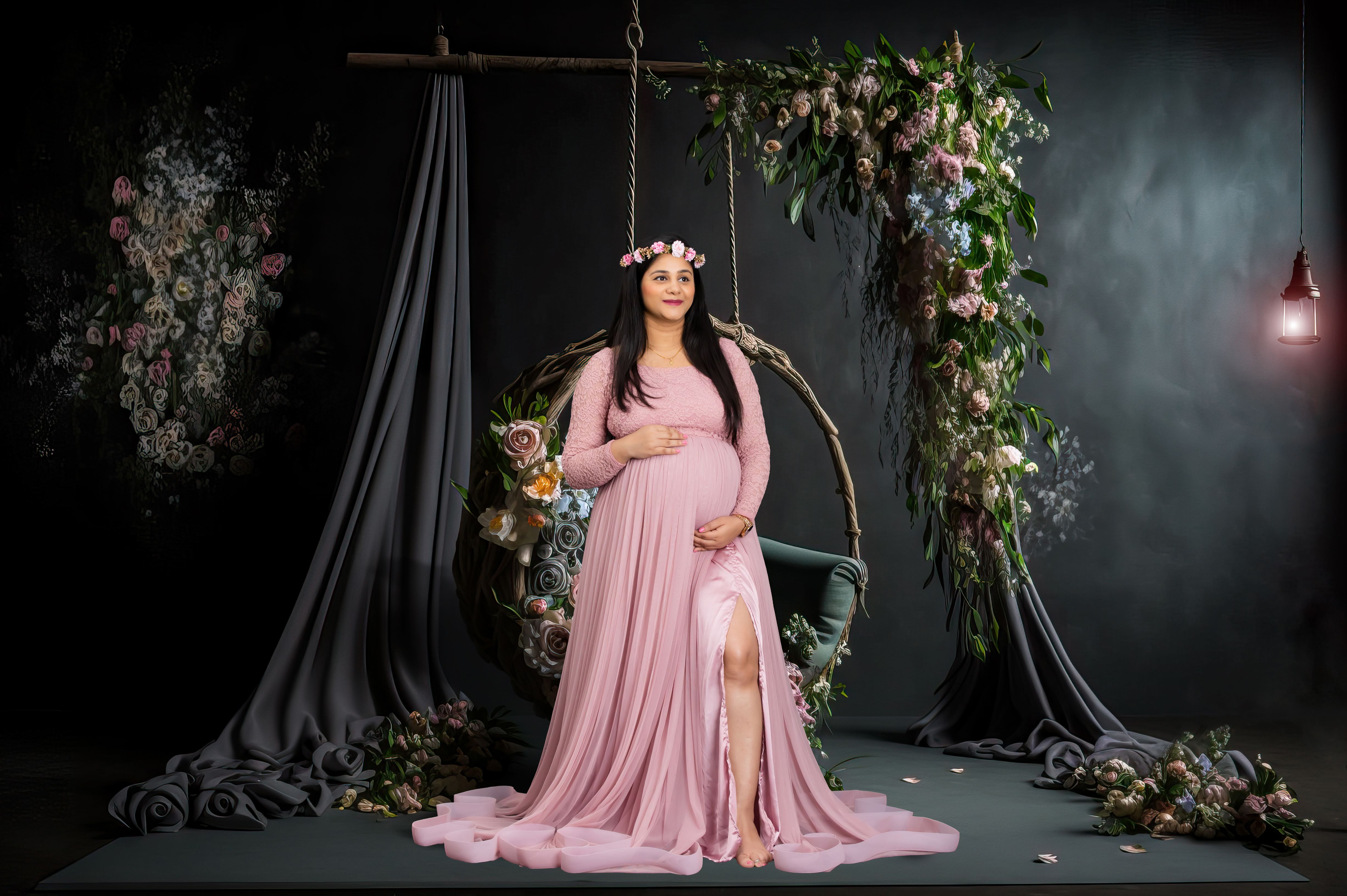 Beautiful third-trimester maternity shoot in Aligarh with flower wall